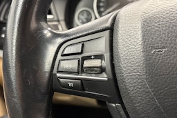 valkoinen BMW 518 2015 kuva 19.