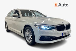 valkoinen BMW 518 2019 kuva 1.