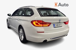 valkoinen BMW 518 2019 kuva 2.