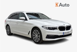 valkoinen BMW 518 2019 kuva 1.