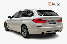 valkoinen BMW 518 2019 kuva 2.