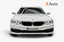 valkoinen BMW 518 2019 kuva 4.