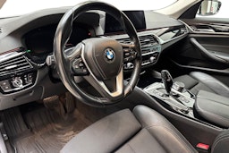 valkoinen BMW 518 2019 kuva 6.