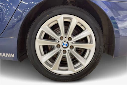 sininen BMW 520 2008 kuva 9.