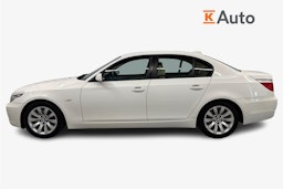 valkoinen BMW 520 2009 kuva 6.