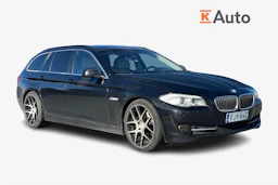 Musta BMW 520 2010 kuva 1.