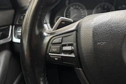 Musta BMW 520 2011 kuva 14.