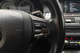 Musta BMW 520 2011 kuva 15.