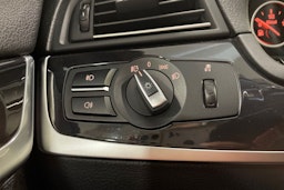 Harmaa BMW 520 2011 kuva 18.