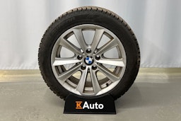 musta BMW 520 2011 kuva 11.