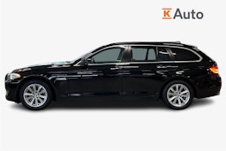 musta BMW 520 2011 kuva 6.