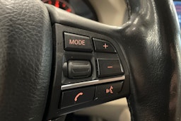musta BMW 520 2011 kuva 18.