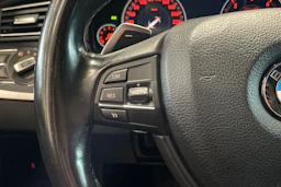 musta BMW 520 2012 kuva 16.
