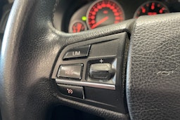 musta BMW 520 2013 kuva 17.