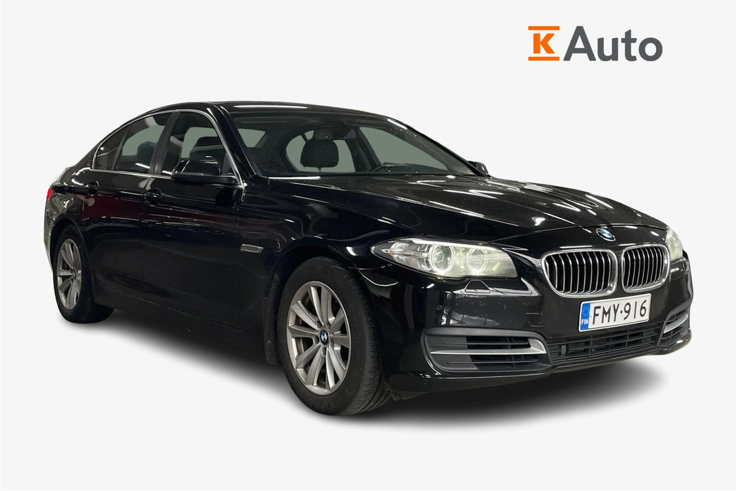 Musta BMW 520 2014 kuva 1.