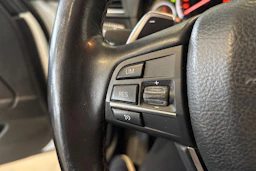 Valkoinen BMW 520 2014 kuva 13.