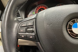 musta BMW 520 2014 kuva 27.