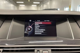 Valkoinen BMW 520 2015 kuva 19.