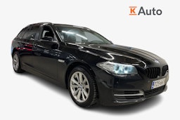 Musta BMW 520 2015 kuva 1.