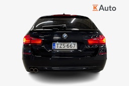 Musta BMW 520 2015 kuva 3.