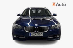 sininen BMW 520 2015 kuva 5.