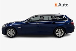 sininen BMW 520 2015 kuva 6.