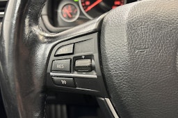 musta BMW 520 2016 kuva 17.