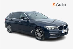 sininen BMW 520 2018 kuva 1.