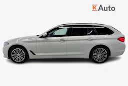 valkoinen BMW 520 2018 kuva 7.