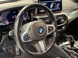 valkoinen BMW 520 2021 kuva 4.