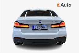 valkoinen BMW 520 2023 kuva 3.