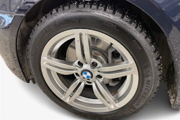 sininen BMW 523 2008 kuva 11.