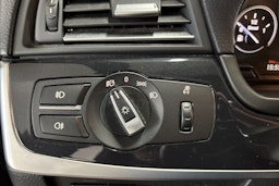 musta BMW 525 2011 kuva 16.
