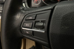 Musta BMW 525 2012 kuva 14.