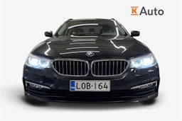 Harmaa BMW 530 2018 kuva 5.