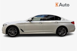 valkoinen BMW 530 2018 kuva 6.