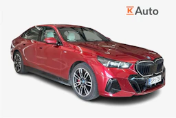 punainen BMW 550 2024 kuva 1.