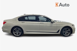 valkoinen BMW 740 2017 kuva 6.