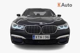 sininen BMW 740 2017 kuva 5.