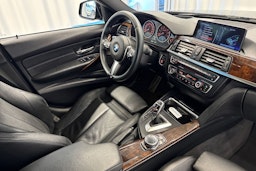 sininen BMW 335 2013 kuva 18.