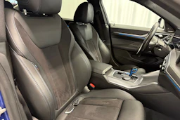 sininen BMW i4 2023 kuva 15.