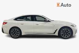 Valkoinen BMW i4 2023 kuva 6.