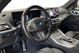 valkoinen BMW i4 2023 kuva 7.