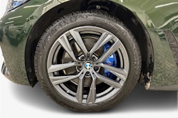 Vihreä BMW i4 2023 kuva 11.