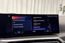 oranssi BMW i4 2023 kuva 21.
