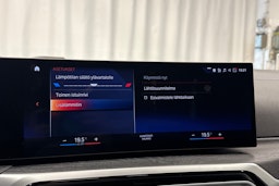 oranssi BMW i4 2023 kuva 25.