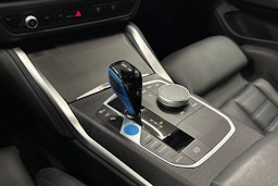 oranssi BMW i4 2023 kuva 26.