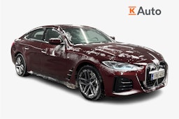 Punainen BMW i4 2024 kuva 1.