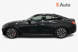 musta BMW i4 2024 kuva 7.
