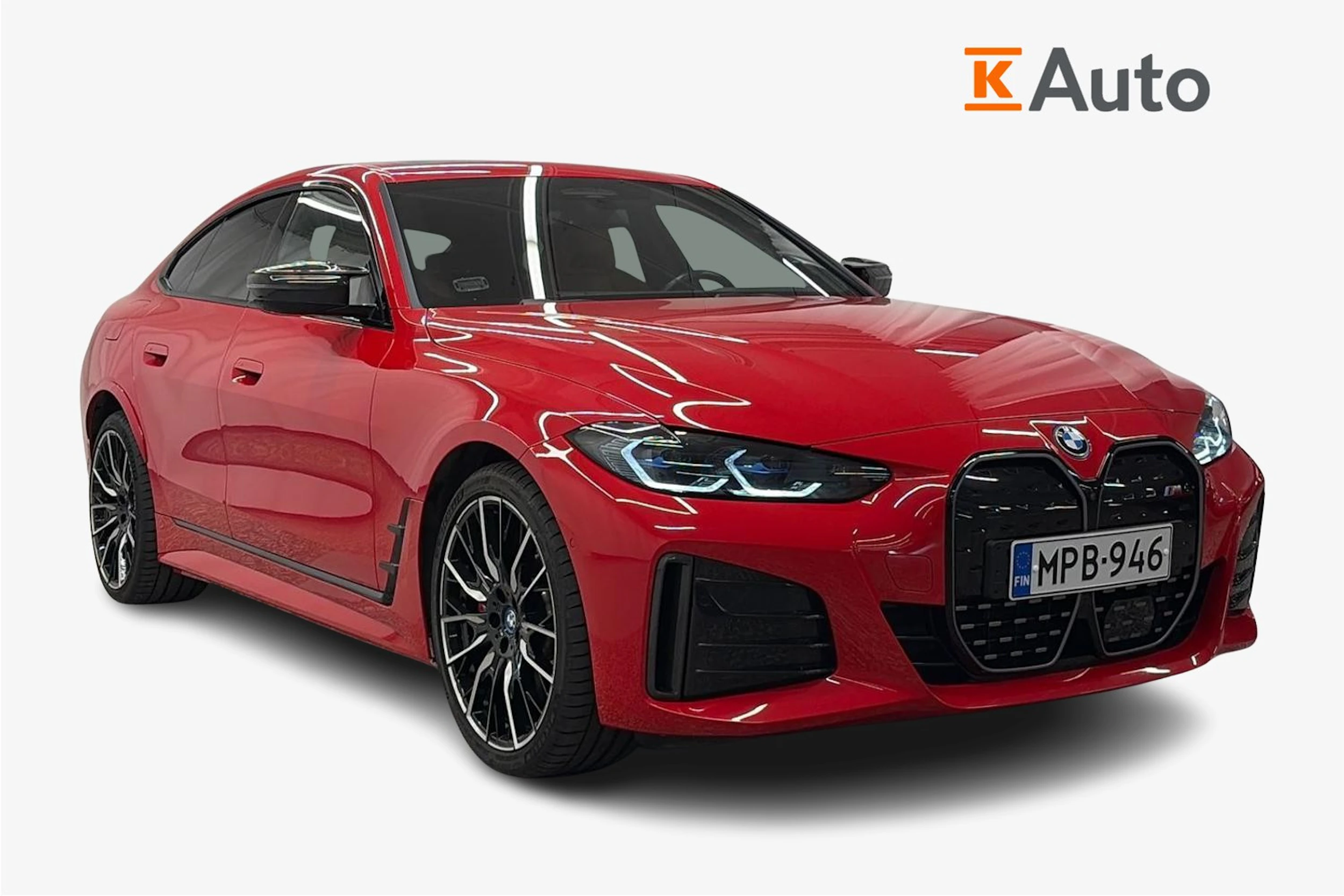punainen BMW i4 2024 kuva 1.